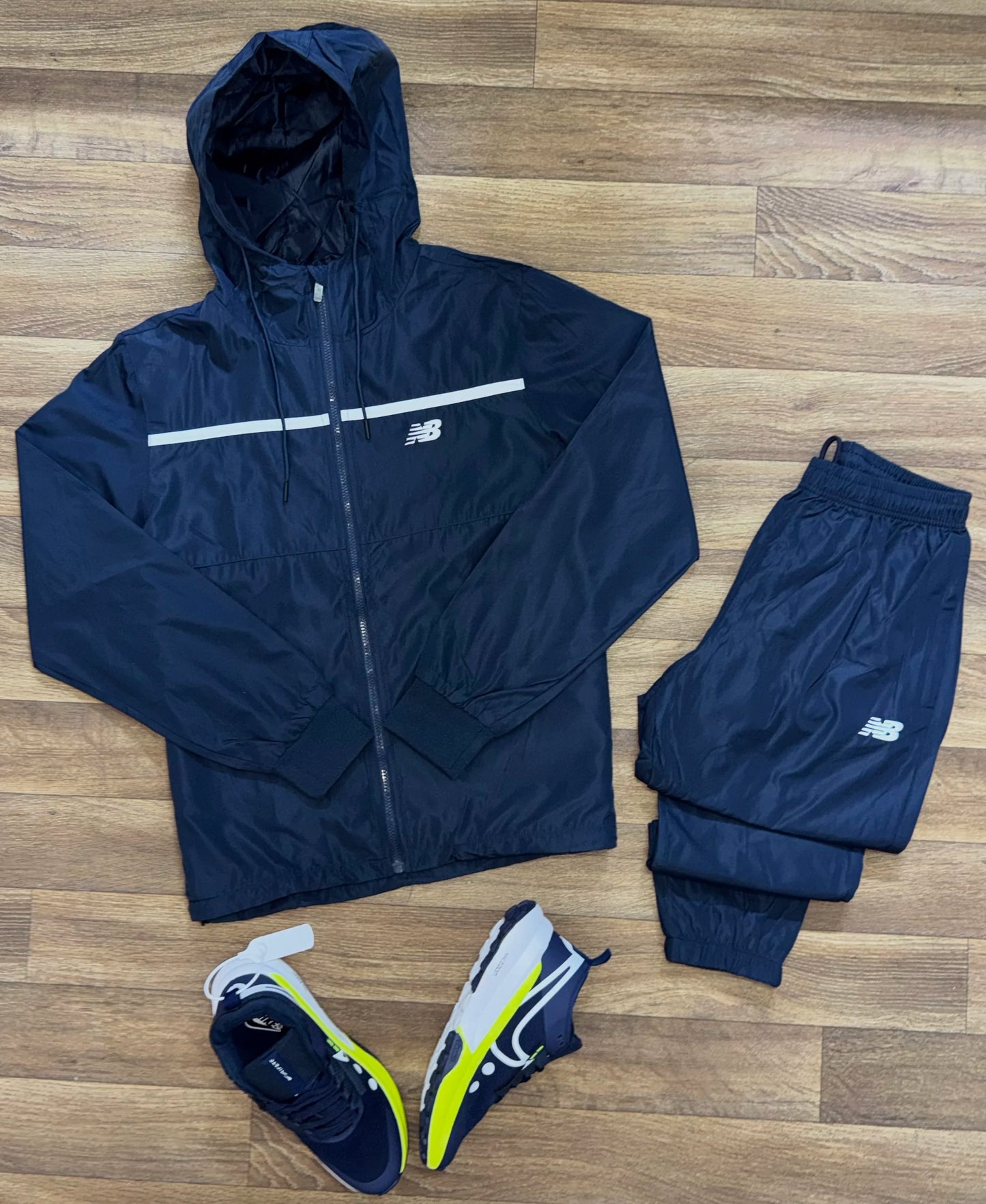 Survêtement Imperméable New Balance – Confort et Performance